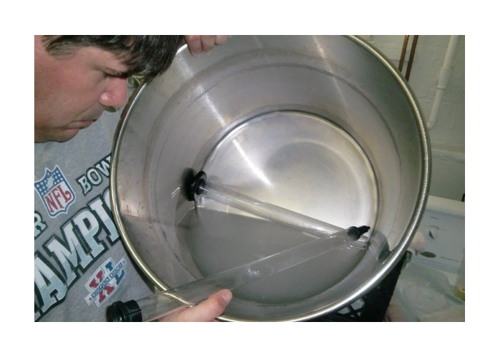 Draining sanitizing solution into carboy